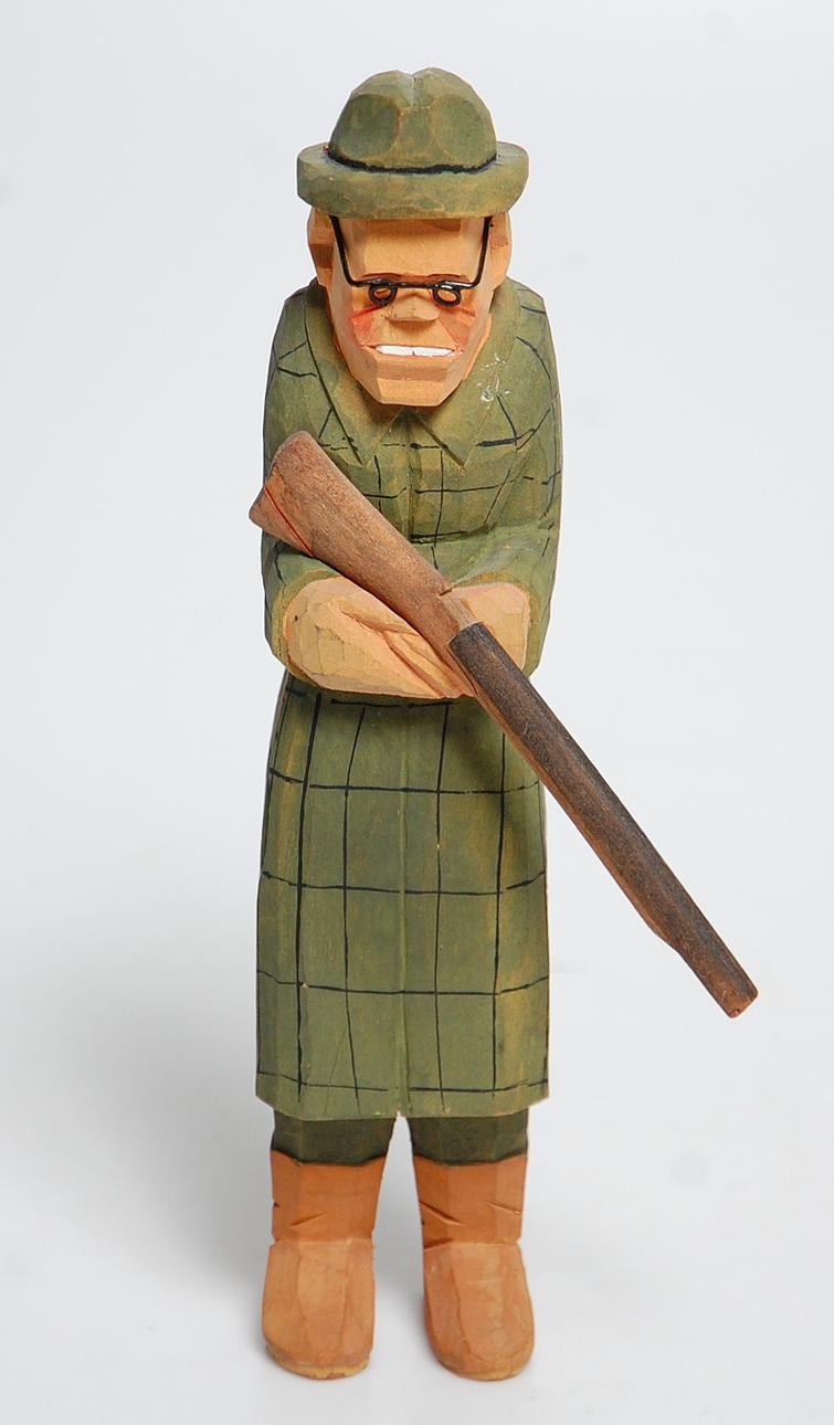 O. NILSSON. träskulptur, " Jägare " signerad.