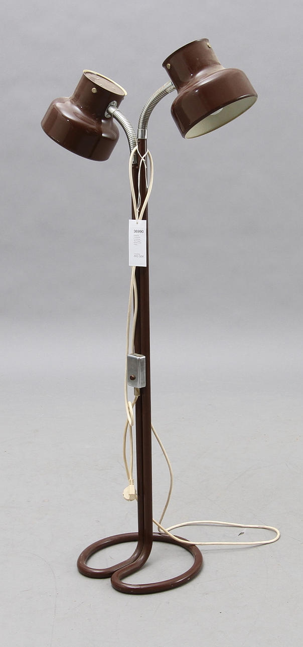 ANDERS PERSSON. Golvlampa, "Bumlingen", dubbel, brun metall.