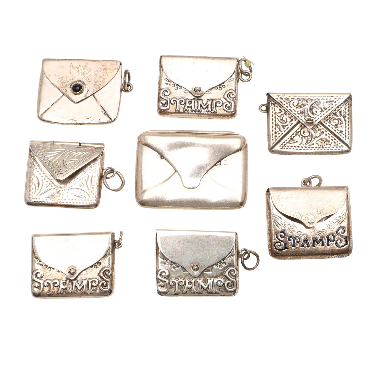 VARIOUS SILVER STAMP CASES.