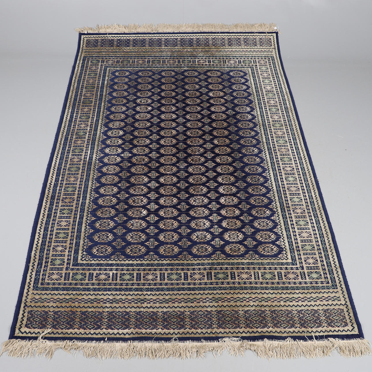 A MACHINE MADE RUG OF 'BUKHARA' DESIGN. Carpets & Textiles - Carpets ...