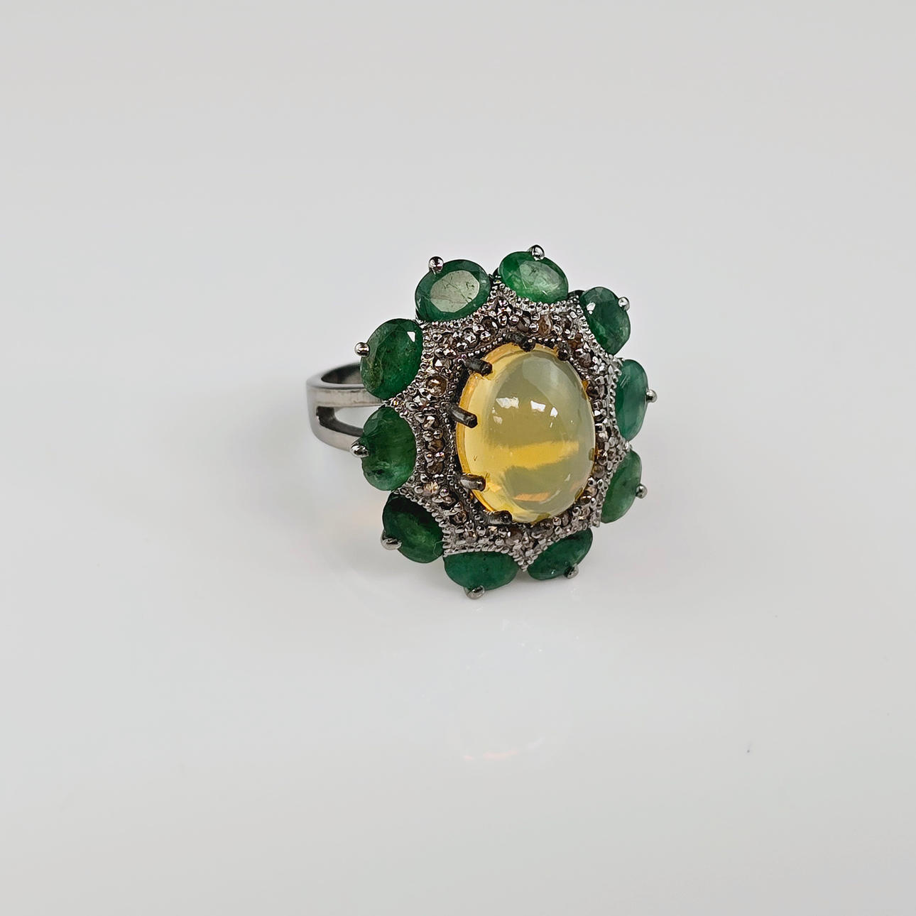 Opal, Emerald and Diamond Ring.