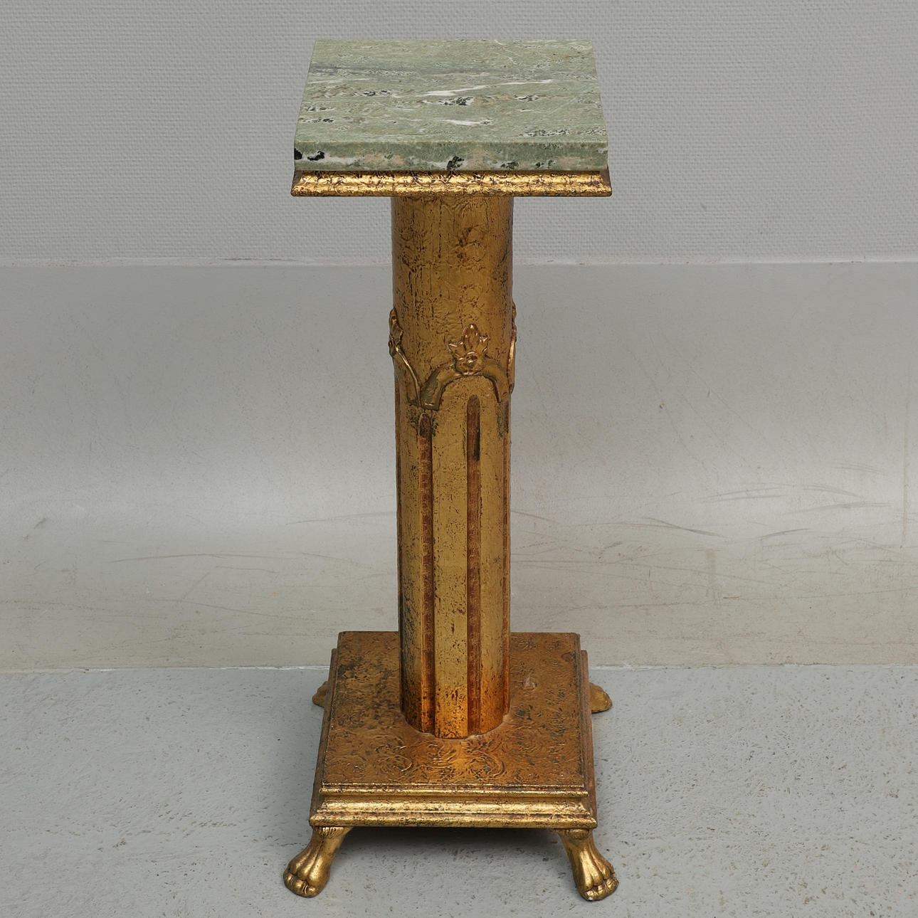 PEDESTAL with marble top. 20th century.