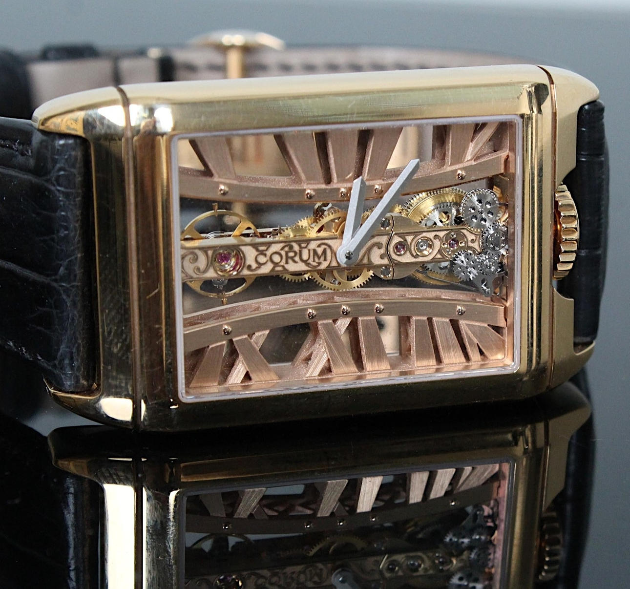 CORUM. Herrklocka, modell 'Golden Bridge Rectangle', 750 roséguld.