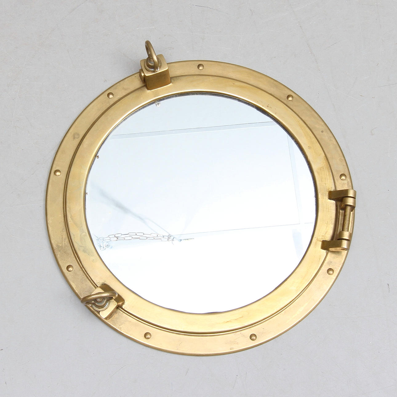 SPEGEL i form av fartygsventil, 19/2000-tal.