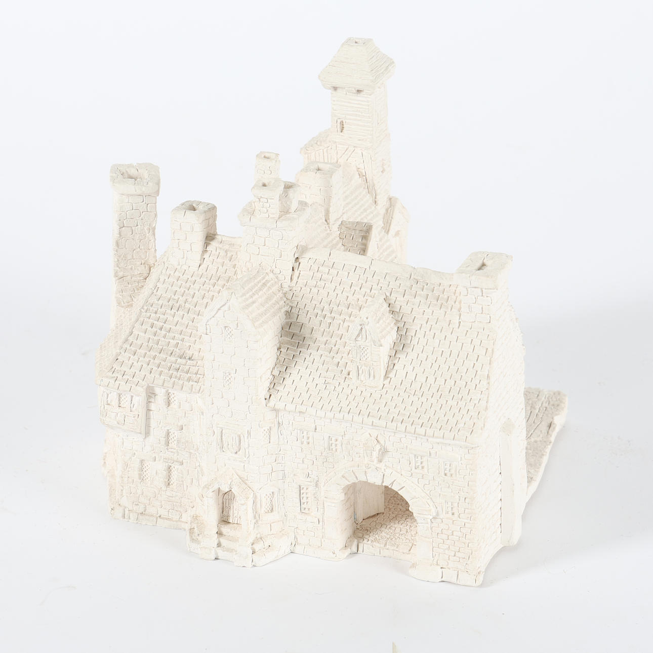 EN OMÅLAD CLARECRAFT DISCWORLD-MODELL.