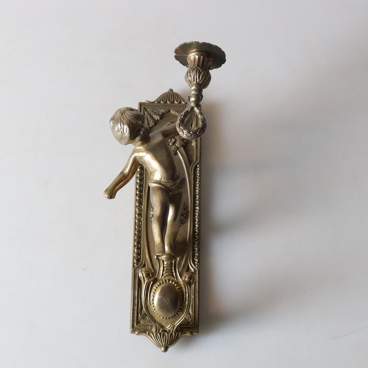 A brass wall sconce, 20th century.