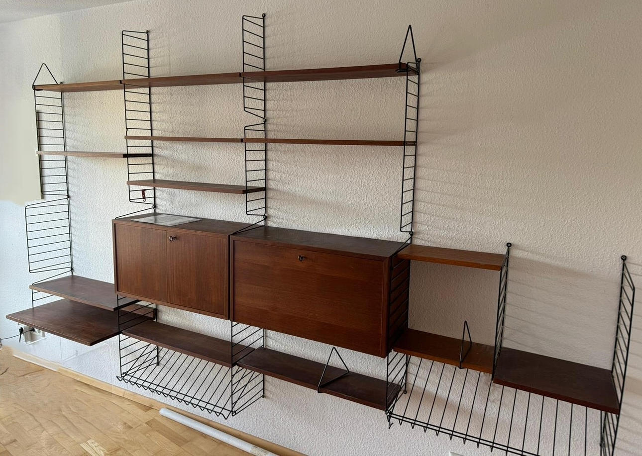 KAJSA & NISSE STRINNING. String. Modular shelving system/String shelf, 'The ladder shelf', teak, Sweden, 1960s.