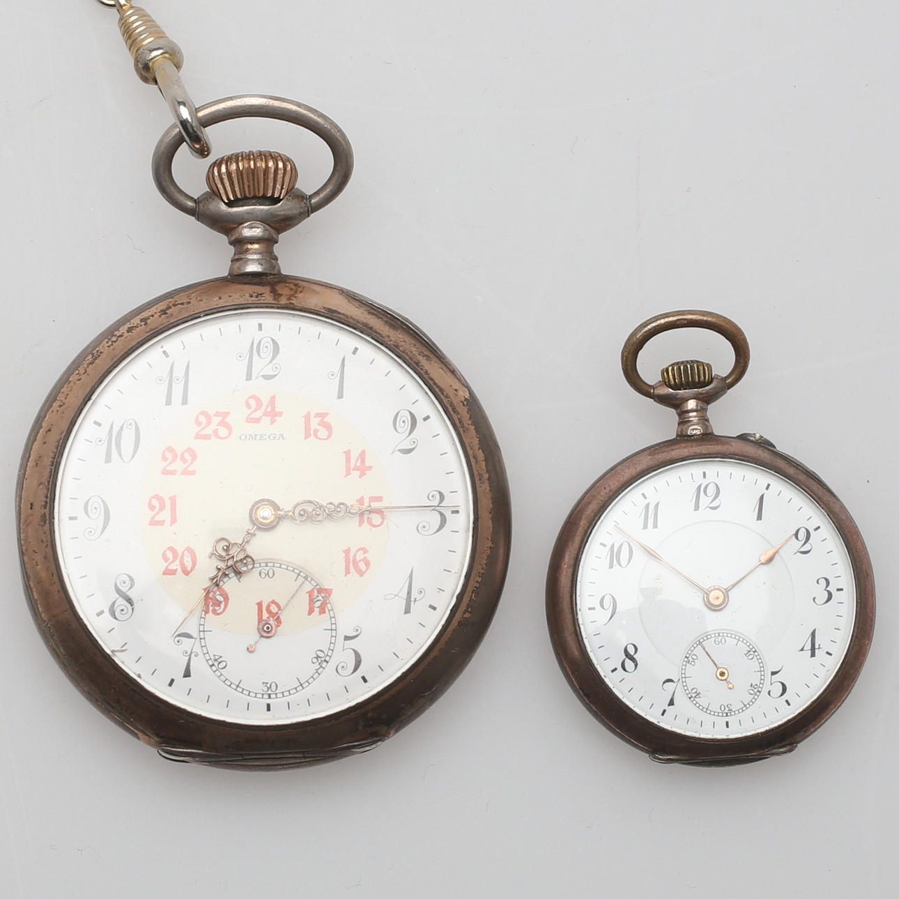 FICKUR, 2 st, silver, Omega samt omärkt, 1900-tal.