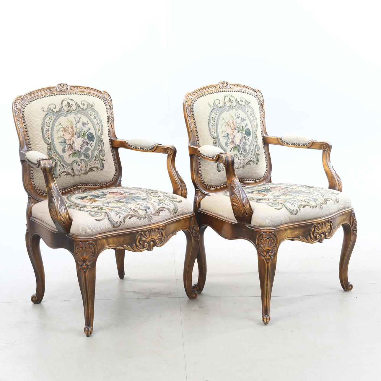 ARMCHAIRS, a pair, with embroidered seat.