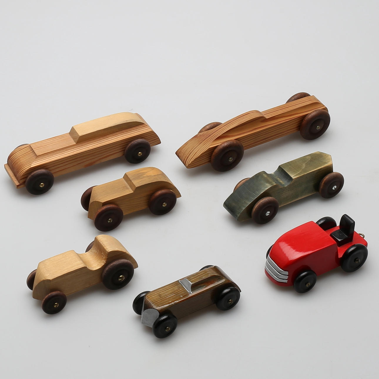 ULF SÄRNEGÅRDH. Parti leksaksbilar Trä sign Ulf Särnegårdh.