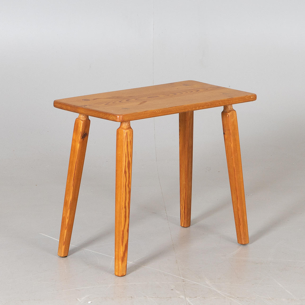 A pine stool, second half of the 20th century.