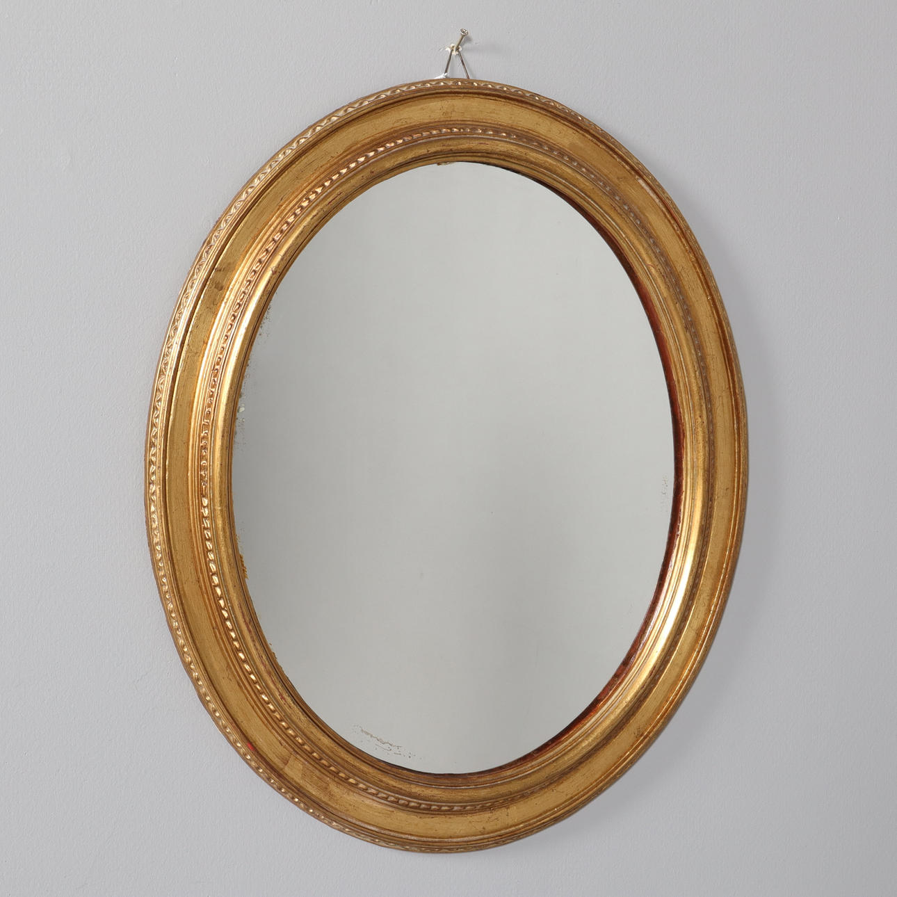 MIRROR, gold colored frame.