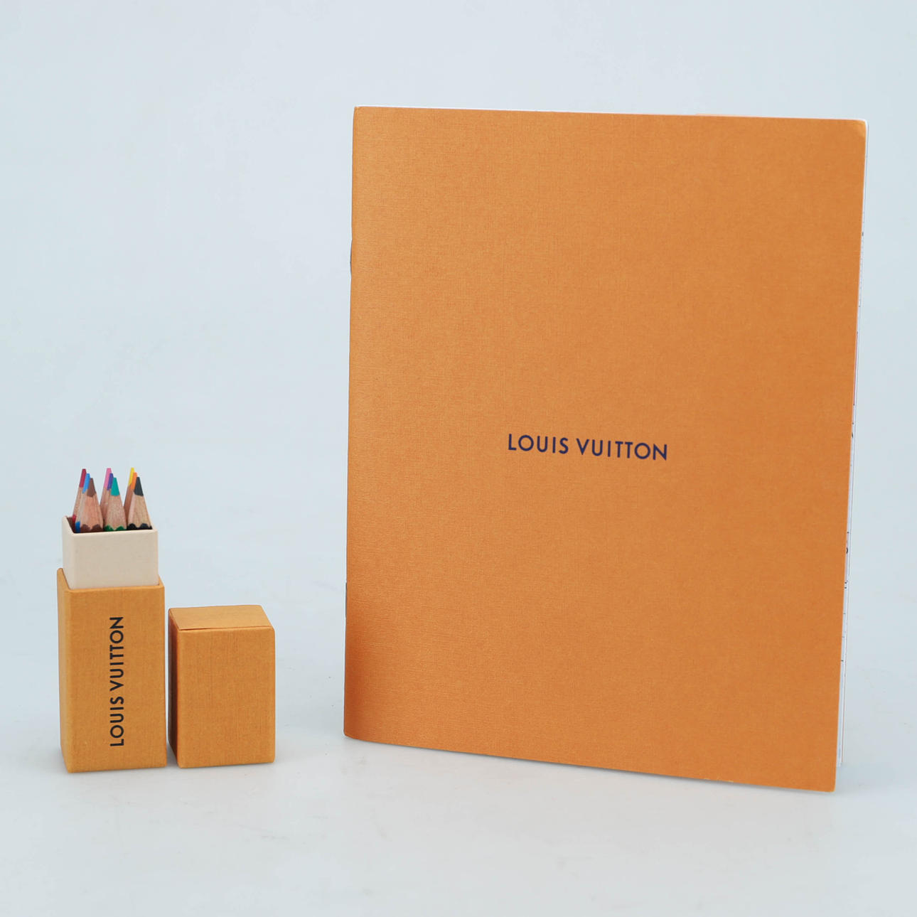 LOUIS VUITTON Coloring book with crayons.