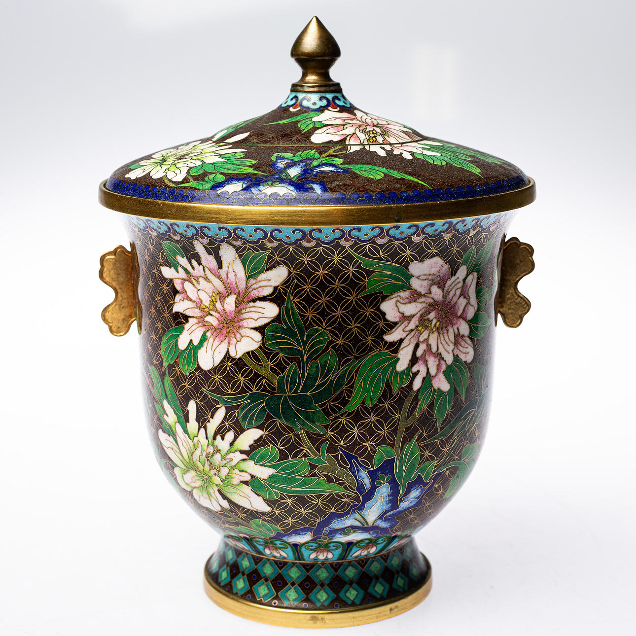 A cloisonne lock urn from China.