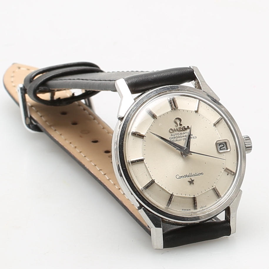 HERRARMBANDSUR, Omega Constellation automatic.