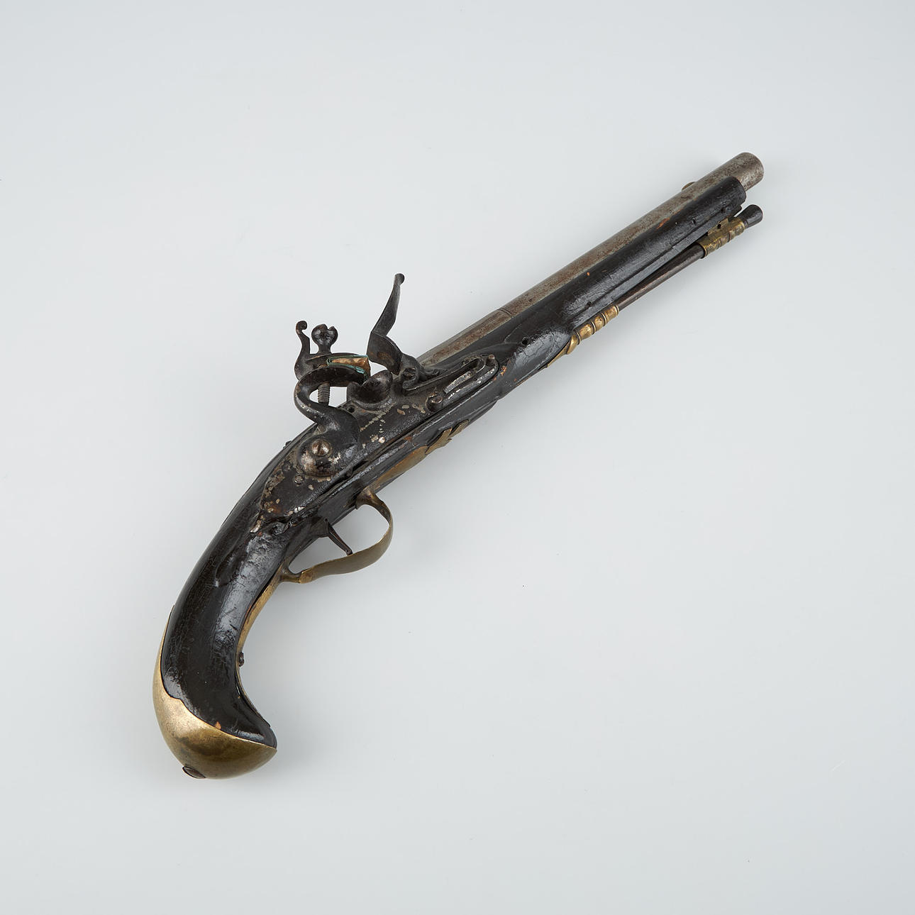 A 17th/19th century FLINTLOCK PISTOL.