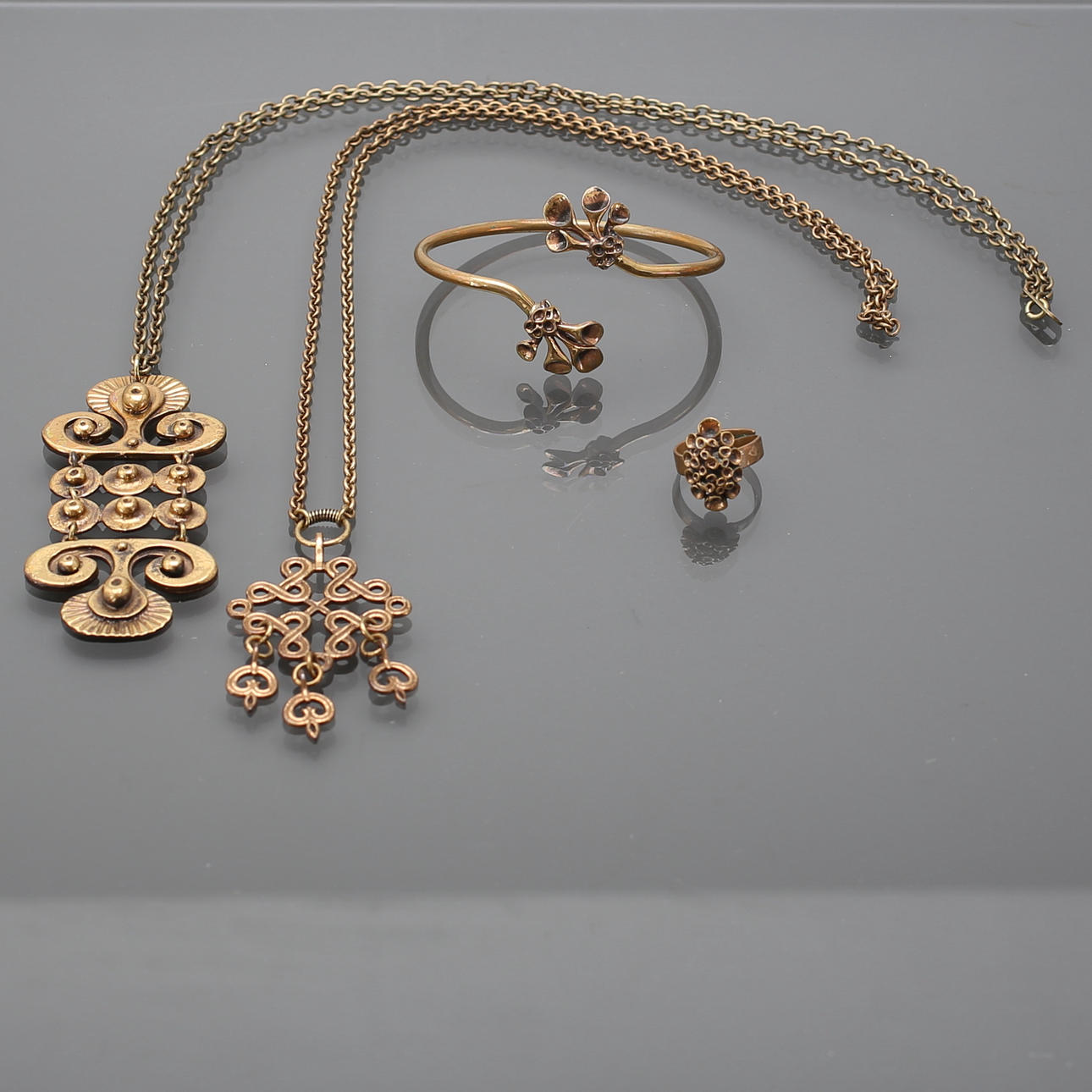 BRONSSMYCKEN, 4 delar, Finland, bl.a Seppo Tamminen.