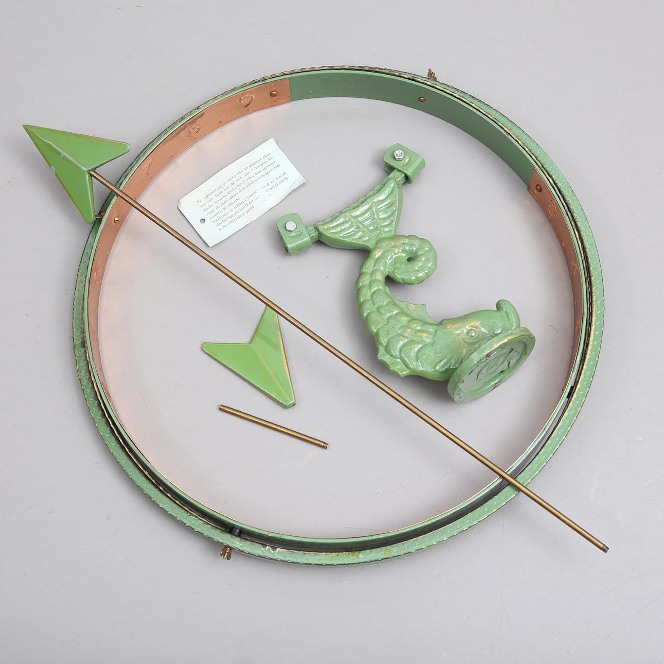 A metal sundial, 20th century.