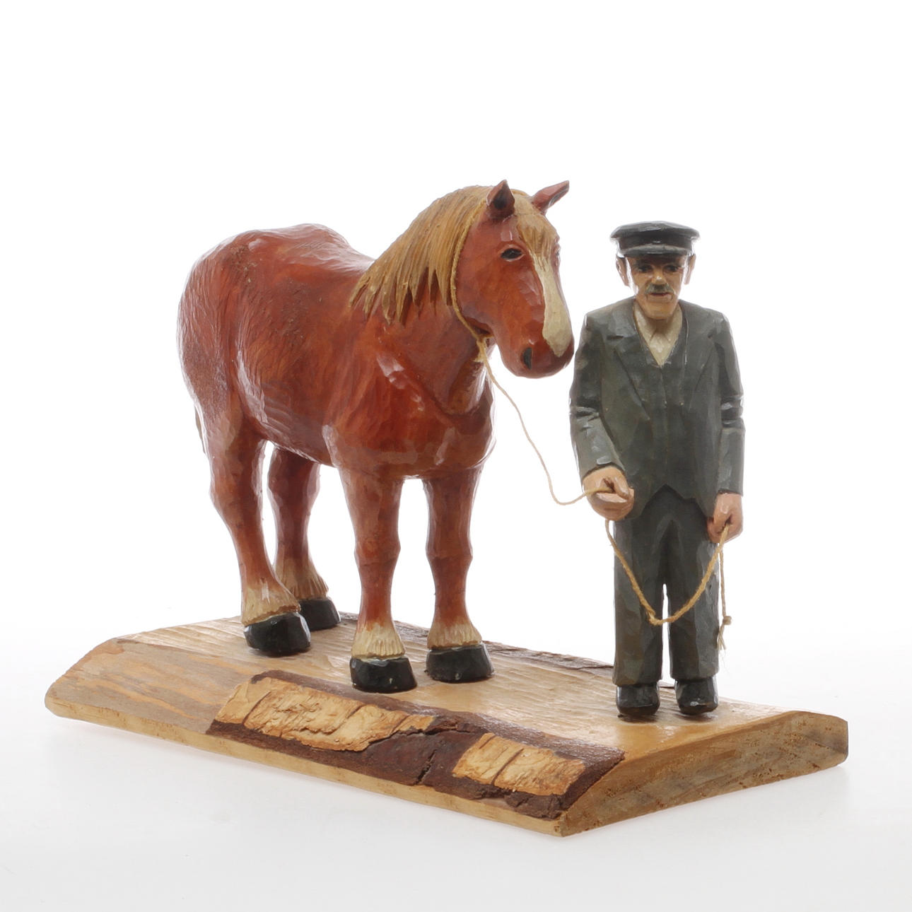 SKULPTURGRUPP, Man med häst, skuret och bemålat trä, signerad K-EP.