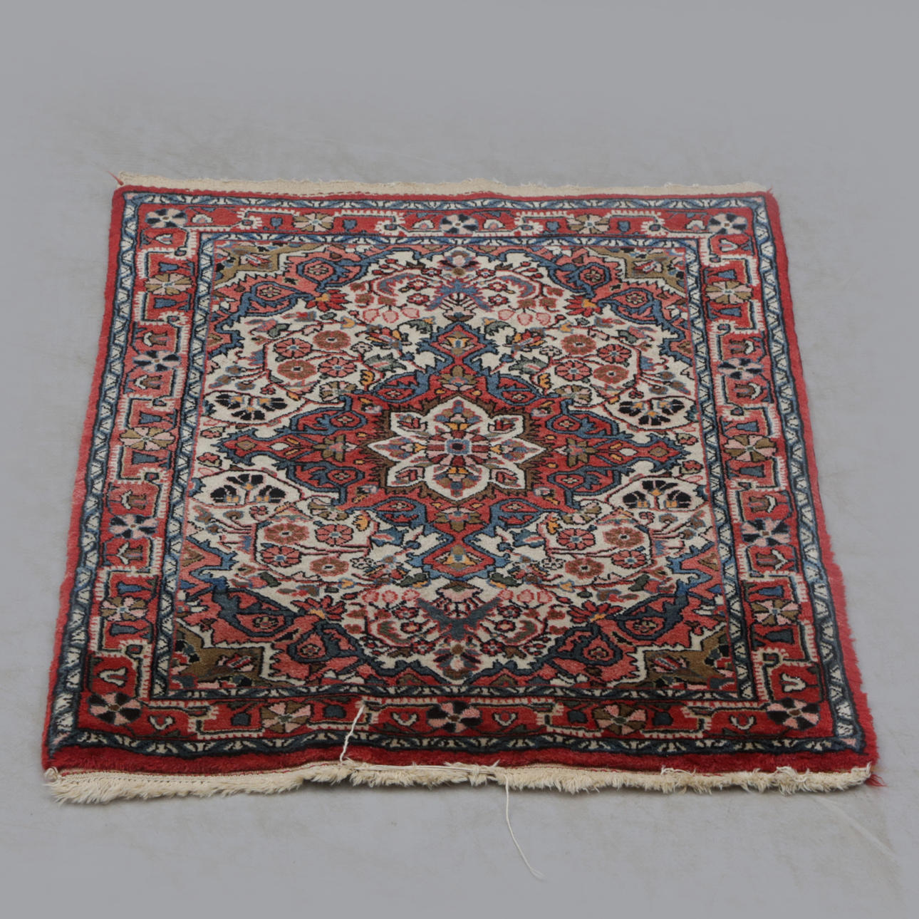 A smaller, oriental rug. 97x62 cm.