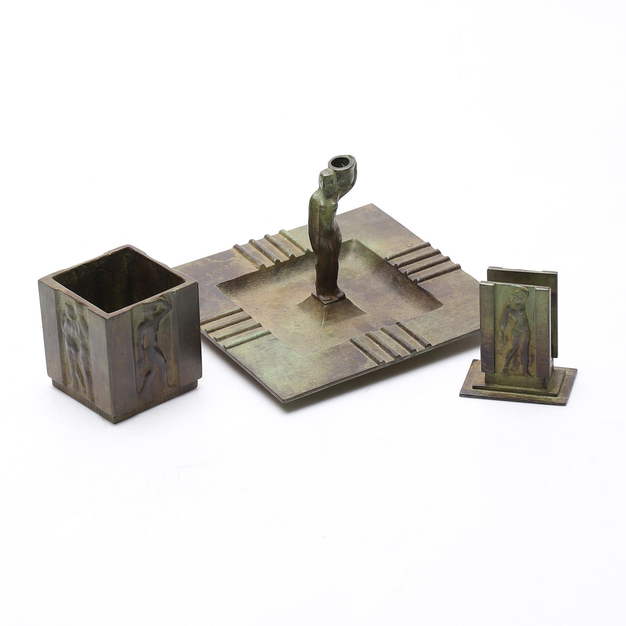 A bronze three-piece tobacco set, GAB.