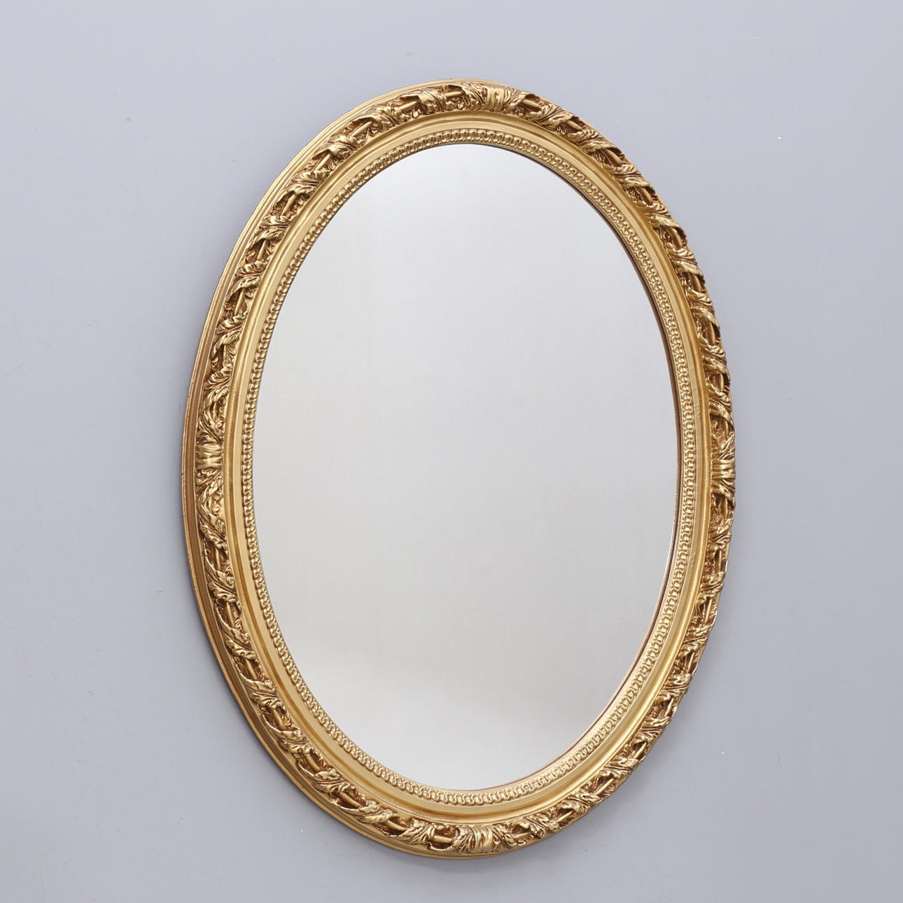 Espejo ovalado, del siglo XX.