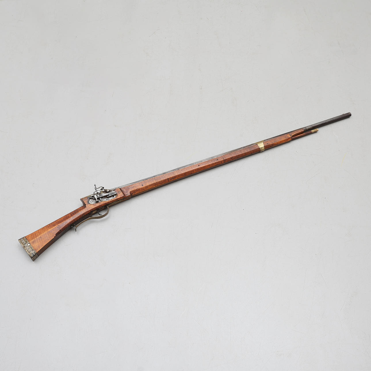 A SPANISH RIFLE WITH CONVERTED PATILLA LOCK, BARREL MARKED MADRID, END ...