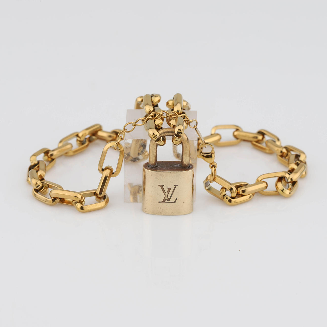 LOUIS VUITTON, Necklace with padlock, gold colour.
