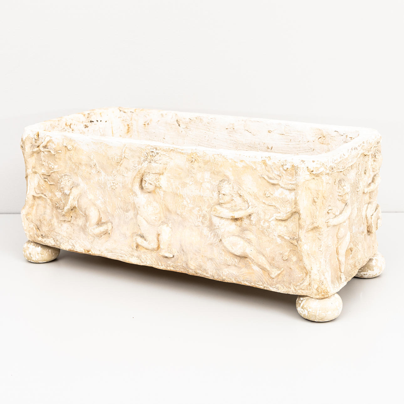 A plaster outer linder/planter, 20th century, first half.