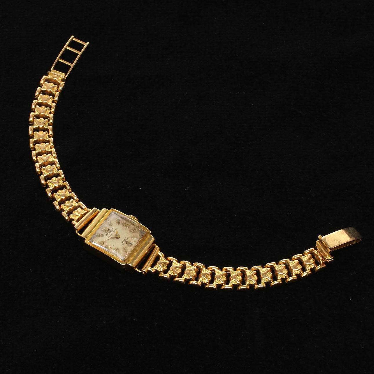 ARMBANDSUR, dam, boett samt länk 18k guld, urtavla märkt Minrona. 1900-tal.