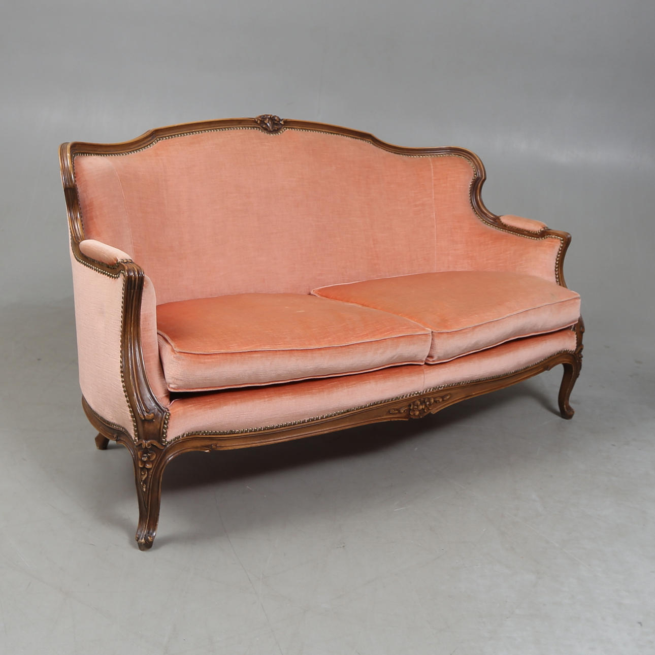 A 20th century Rococo sofa.