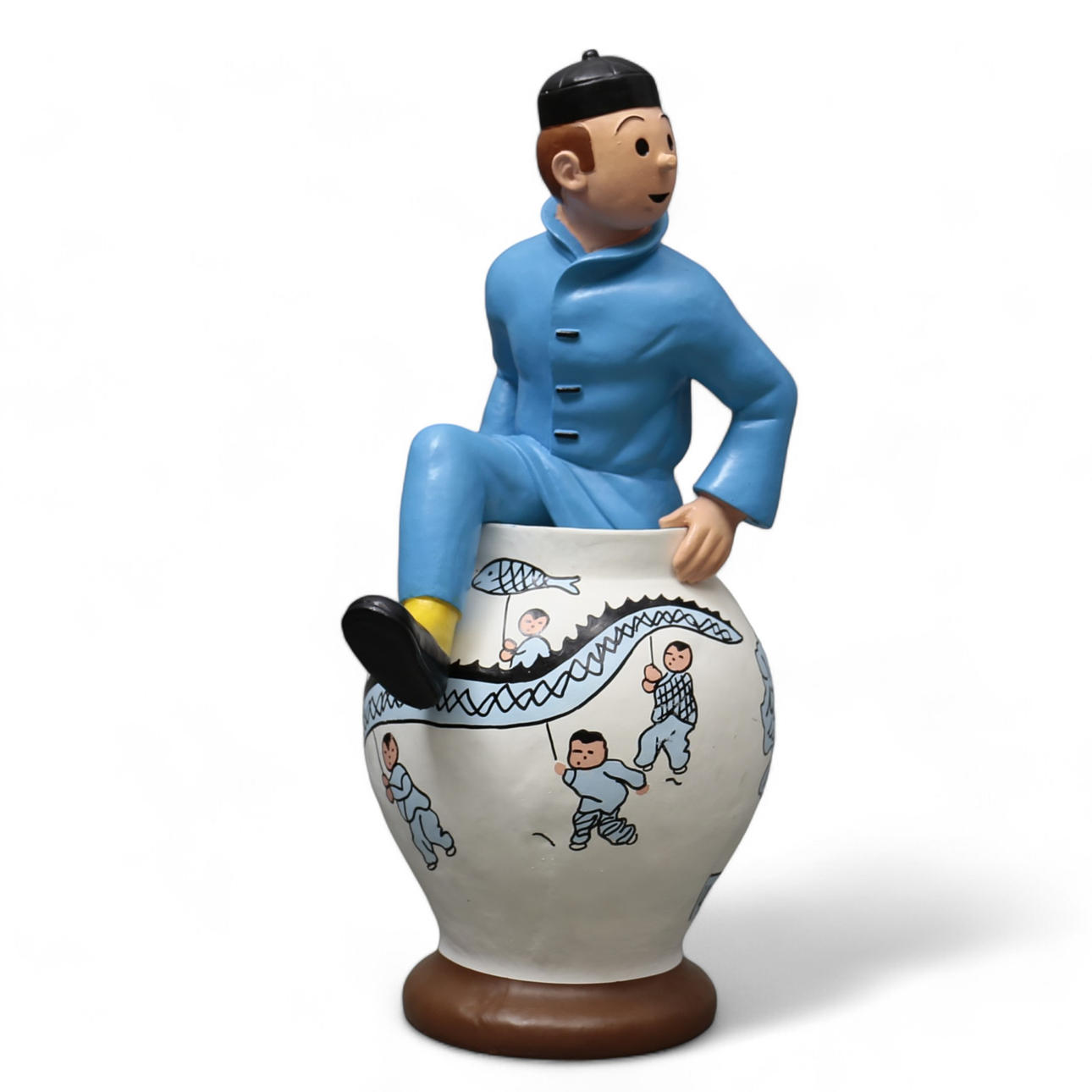 „Tintin med kinesisk vase“, polykrom polyester skulptur.