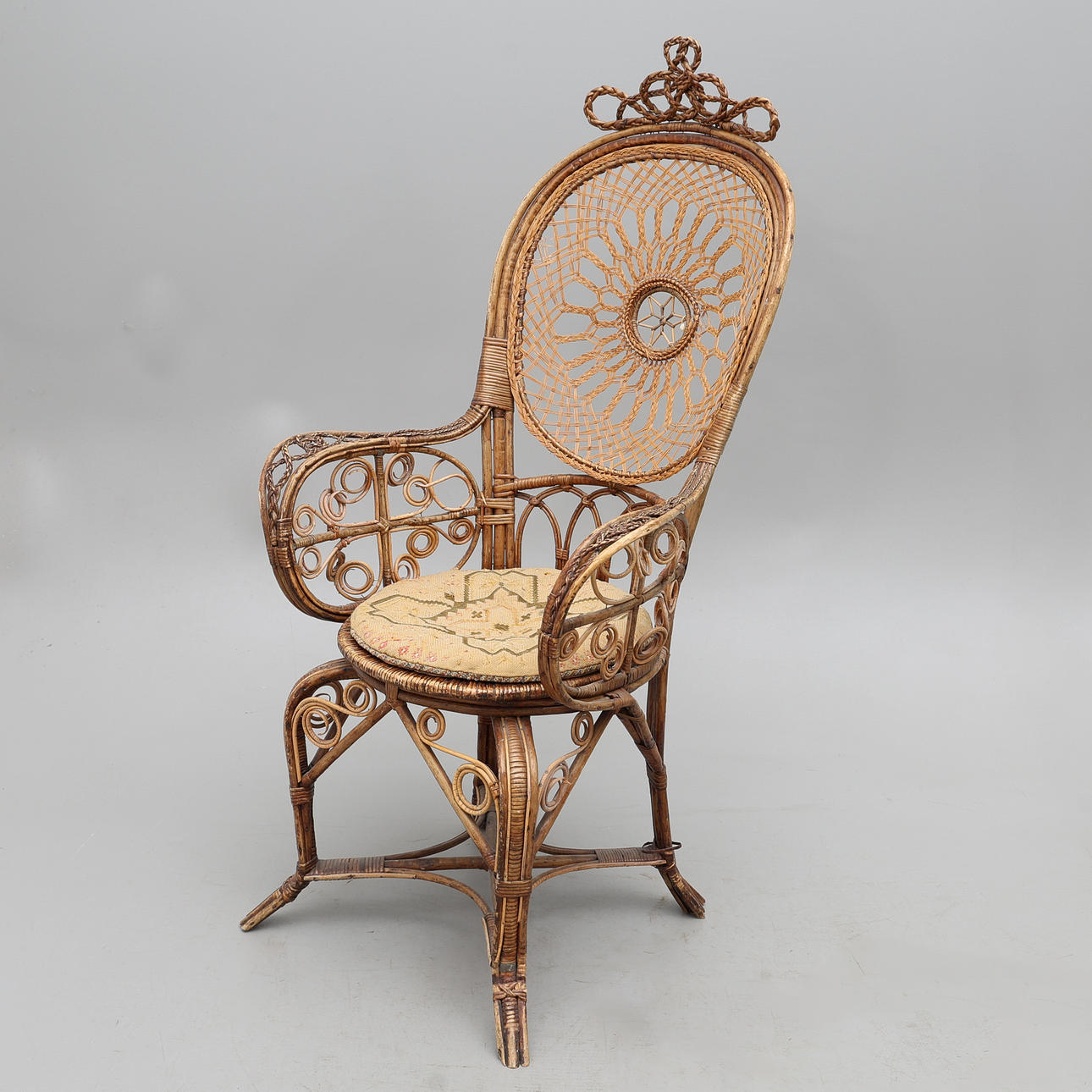 WICKER CHAIR, LATE 19TH CENTURY.