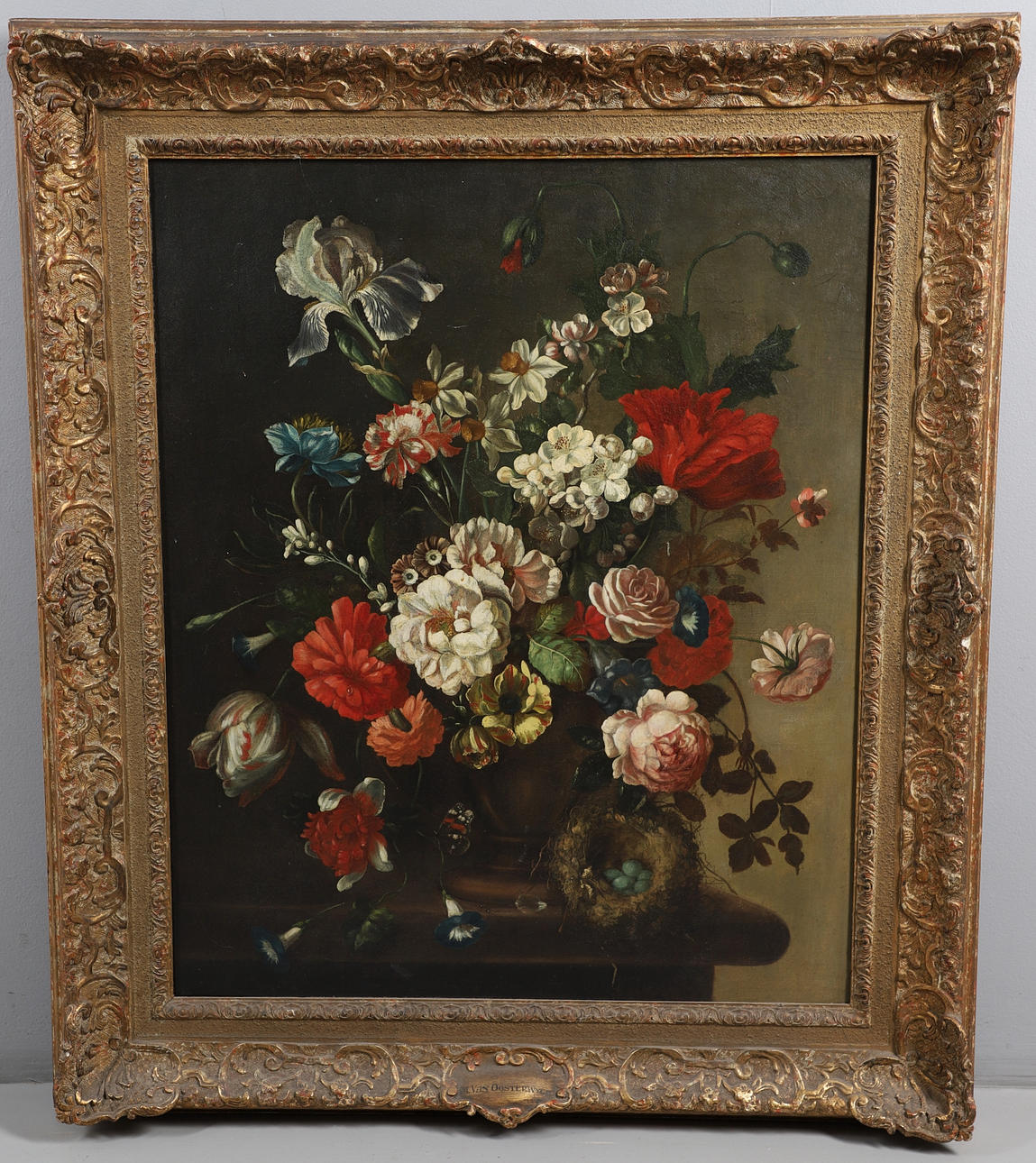 IN THE MANNER OF JAN VAN HUYSUM (1682-1749). STILL LIFE OF MIXED FLOWERS IN A BOWL UPON A LEDGE, WITH A BIRD'S NEST.