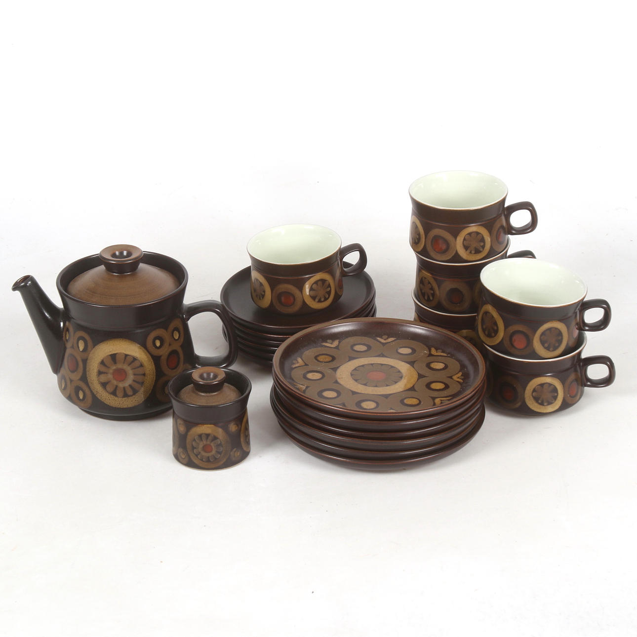 A 20-piece stoneware tea set, “Arabesque” Denby, England.