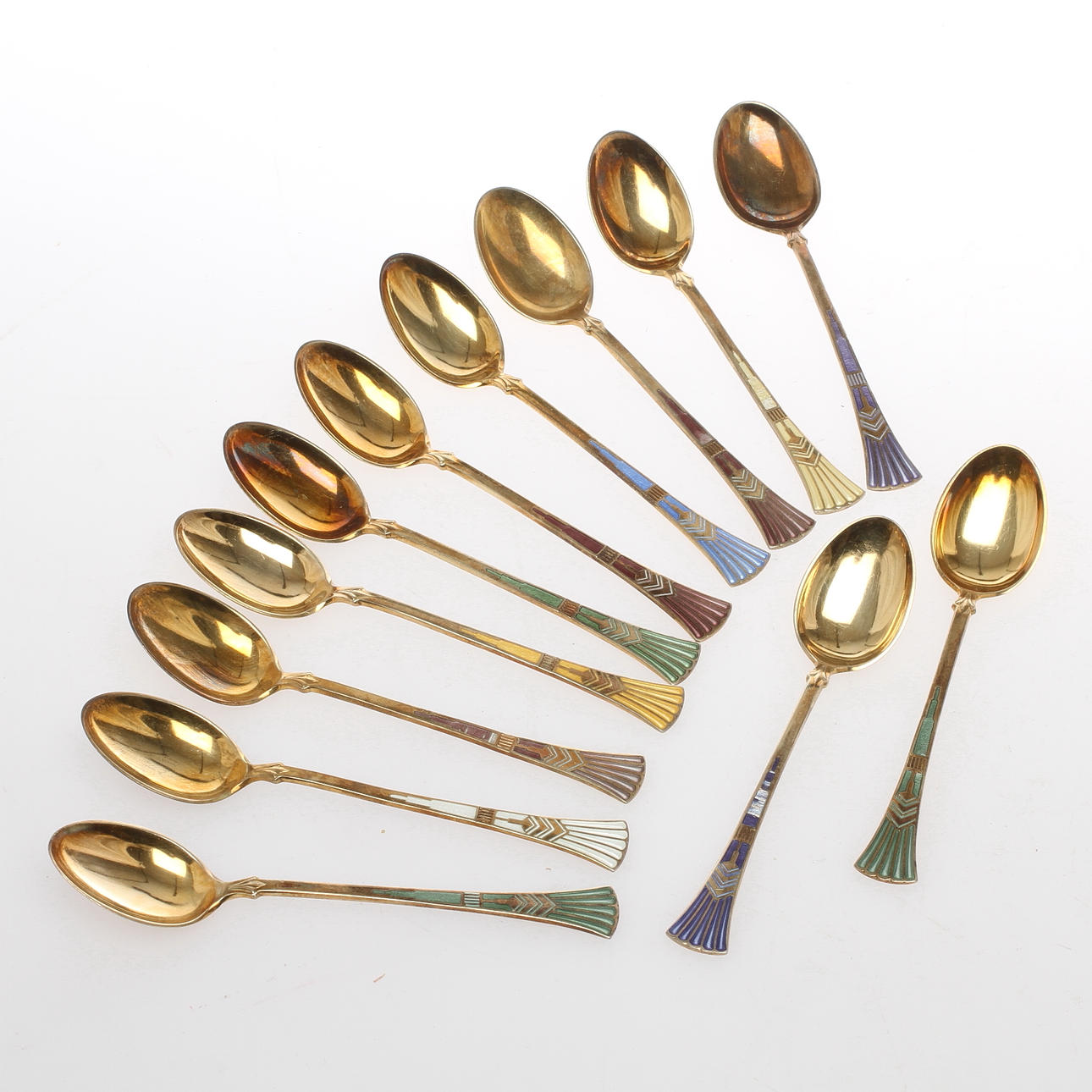 MOCCASKEDAR, 12 st, förgyllt silver med emalj, Thorvald Martinsen, Norge, 1900-tal.