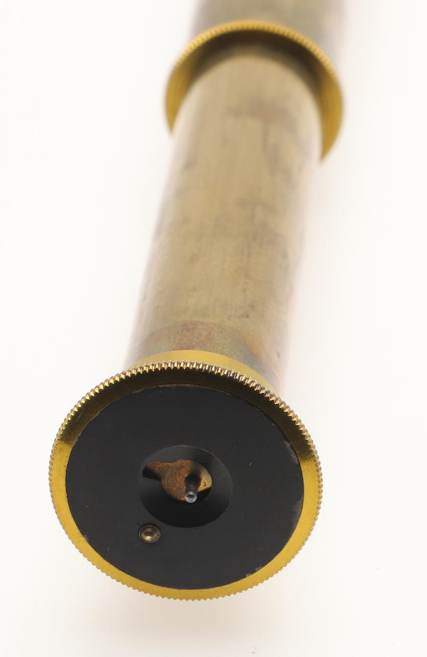 A LATE VICTORIAN OR EDWARDIAN THREE DRAW POCKET TELESCOPE IN LEATHER ...