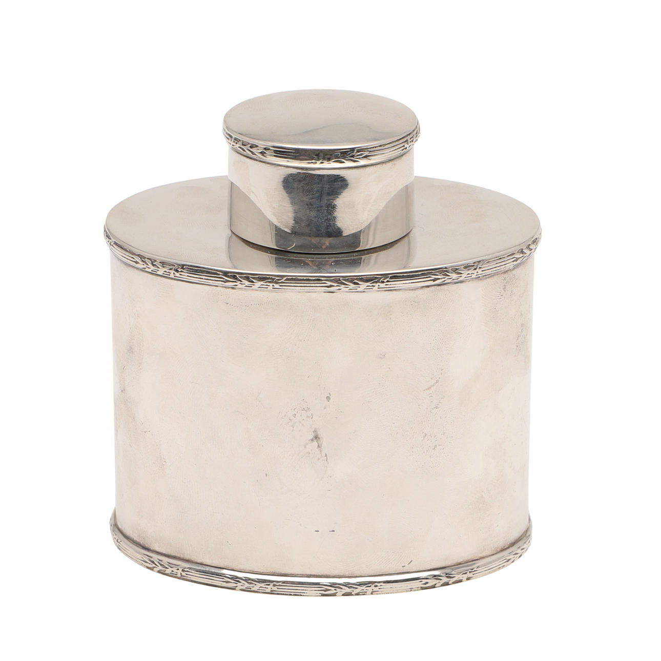 A GEORGE V SILVER TEA CADDY.