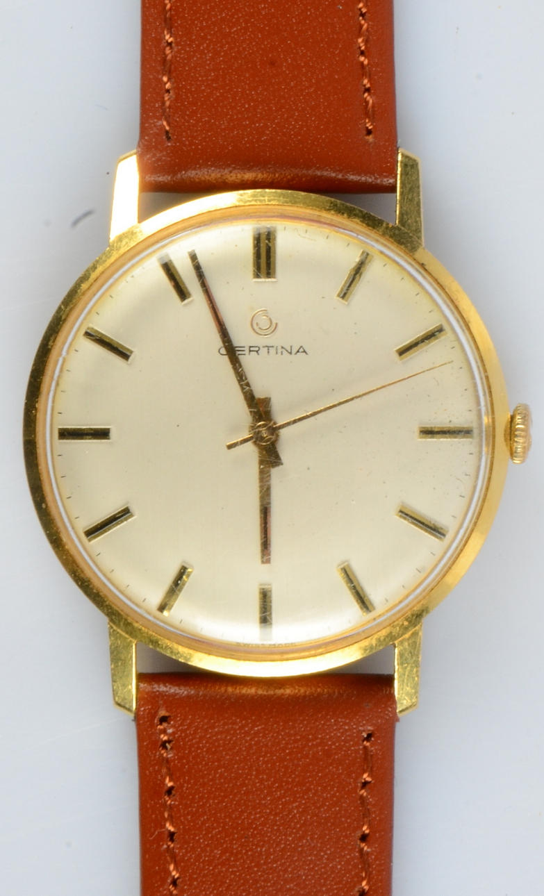 HERRARMBANDSUR, Certina, 18K.
