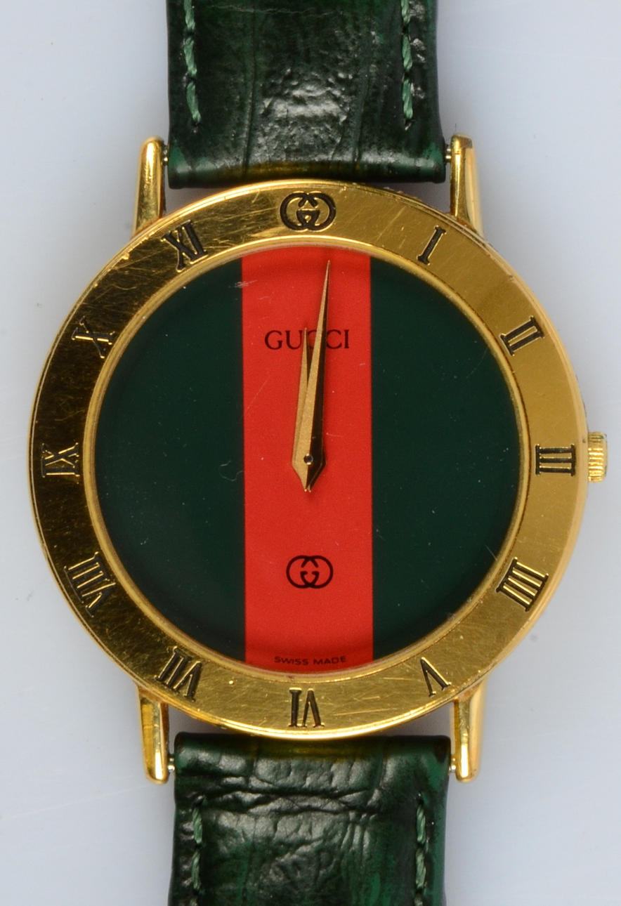HERRARMBANDSUR, Gucci.