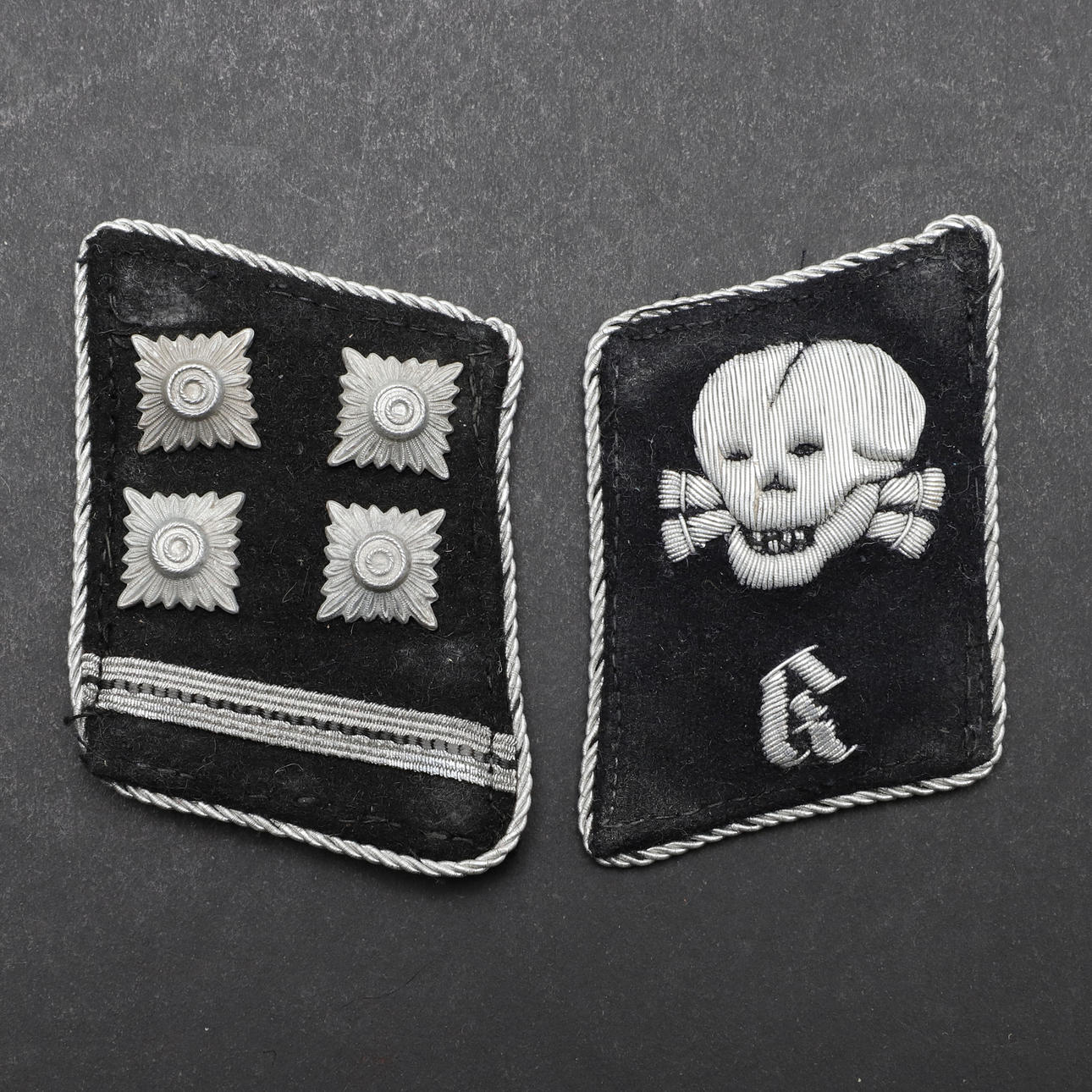 A PAIR OF SECOND WORLD WAR GERMAN SS OFFICER'S COLLAR PATCHES. Weapons ...