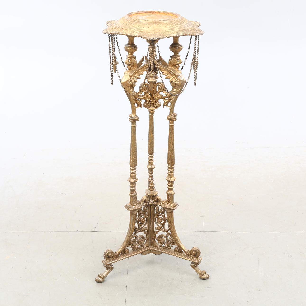 A bronze cast iron pedestal, circa 1900.