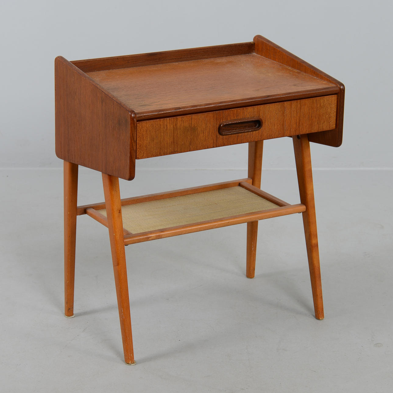 A teak bedside table, 1950s/60s.