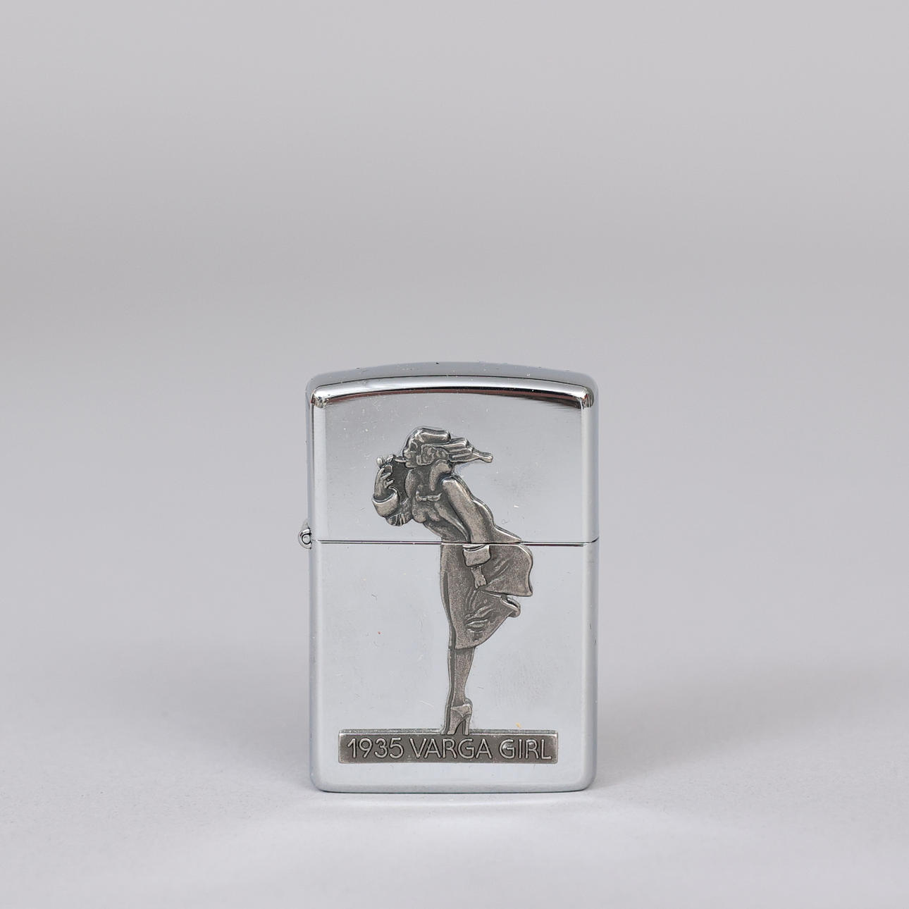 LIGHTER and SIGN, The Varga Girl 1935, Zippo, 1990s. Vintage