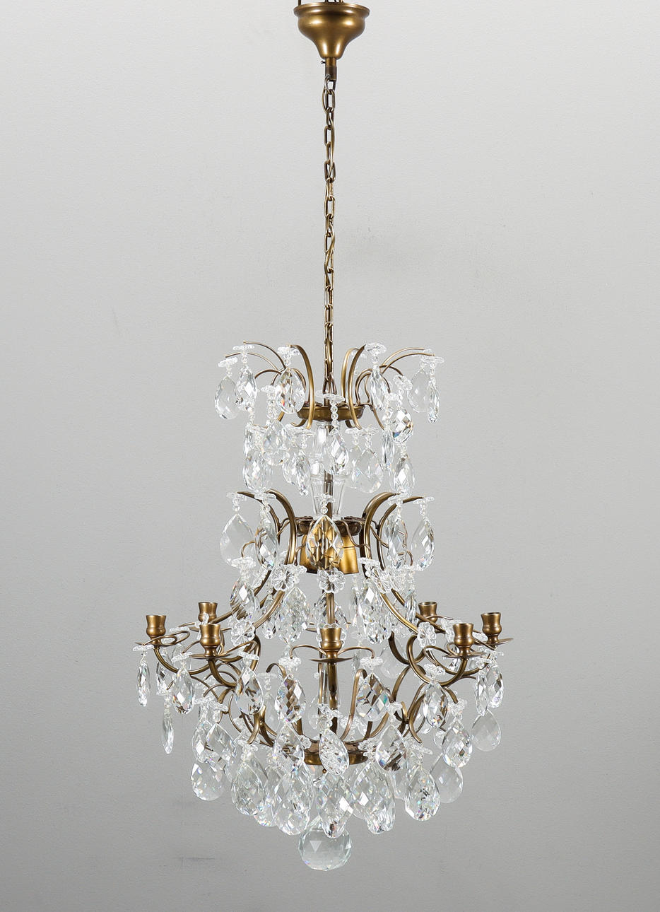 A mid-20th century Rococo crystal chandelier.