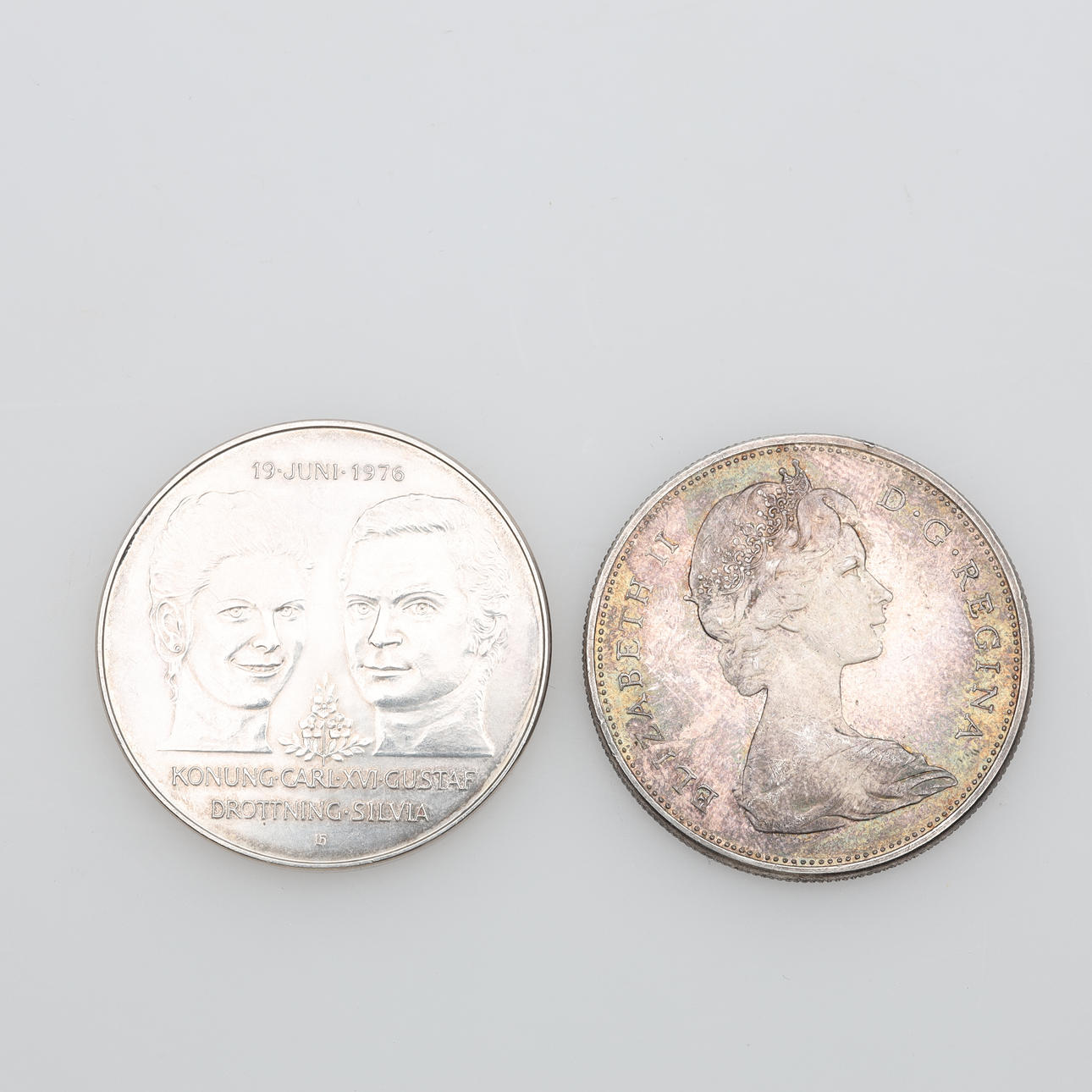 MYNT 2 stycken silver vikt ca 50 gram.