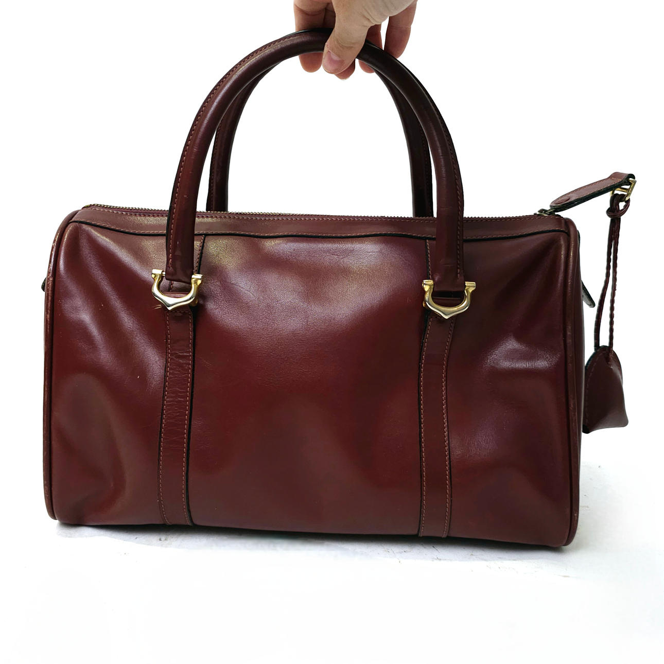 MUST BY CARTIER. BOSTON MODEL LEATHER BAG.