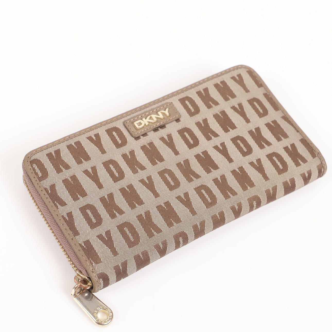 PLÅNBOK, textil/läder, DKNY, USA.