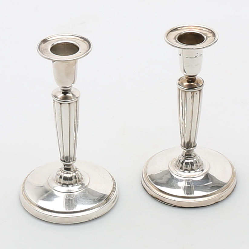 LJUSSTAKAR, ett par i silver. C.G. Hallberg 1955.