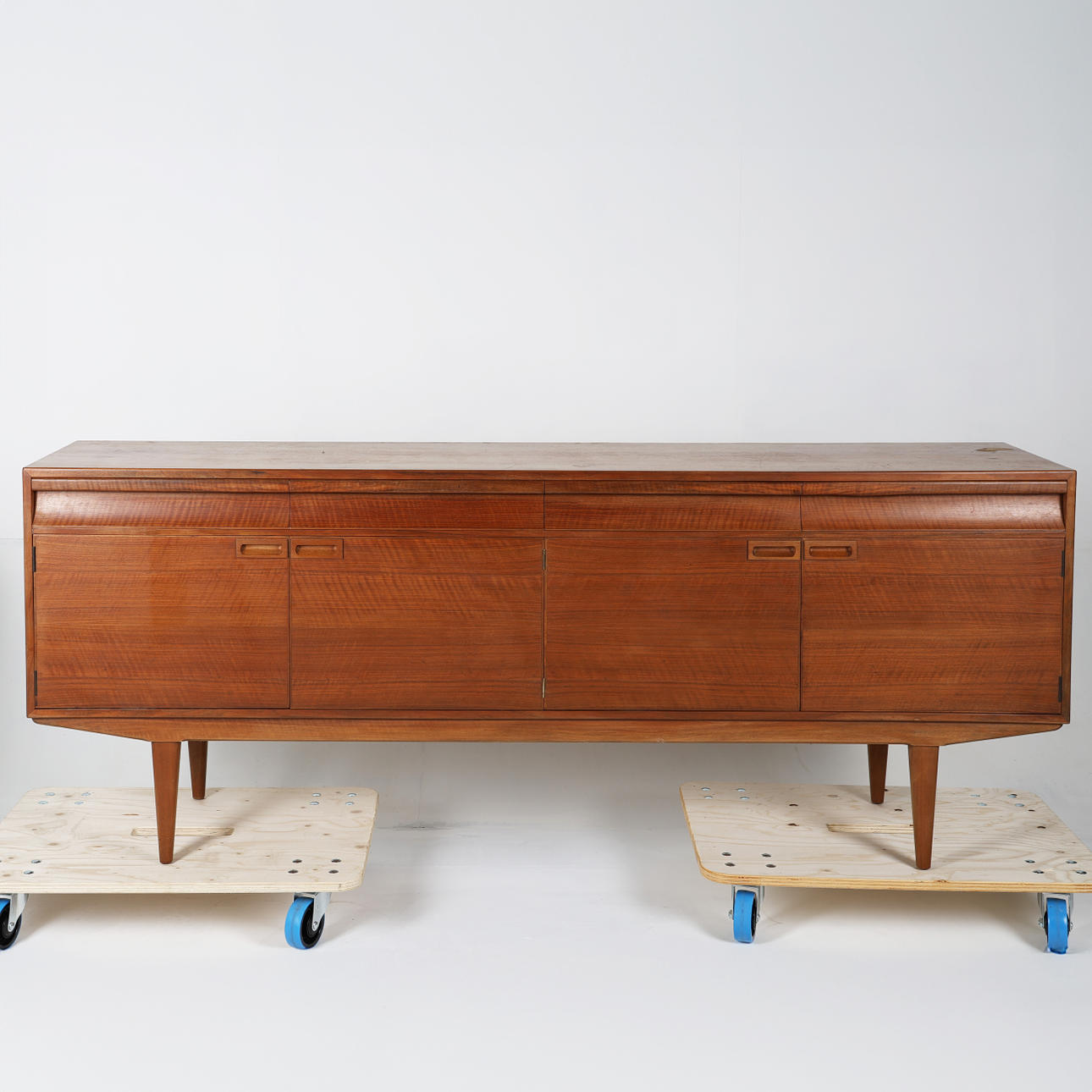 ALFRED COX. A CIRCA 1960'S TEAK SIDEBOARD.